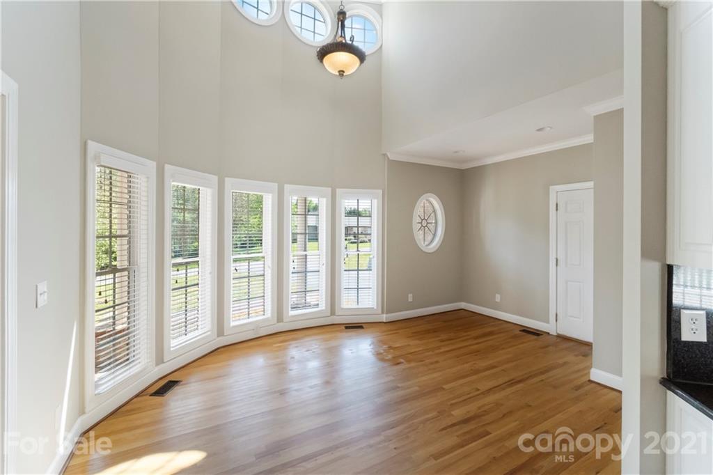 1466 Victorian Hills Circle Conover, NC 28613 - Photo 7 of 40 a view of an empty room with glass door and balcony