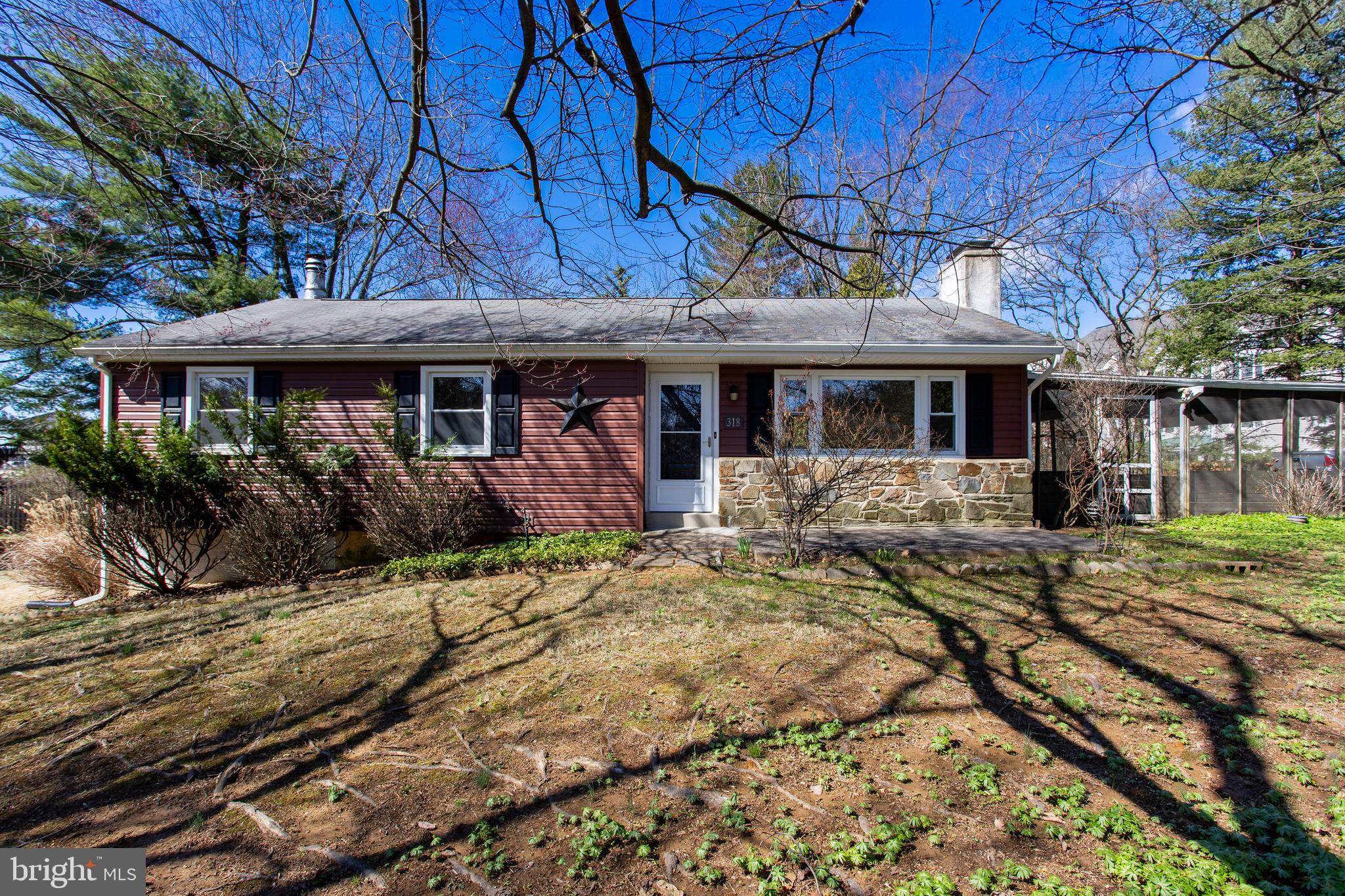 318 Exton Lane Exton, PA 19341 - Photo 1 of 41 a front view of a house with garden
