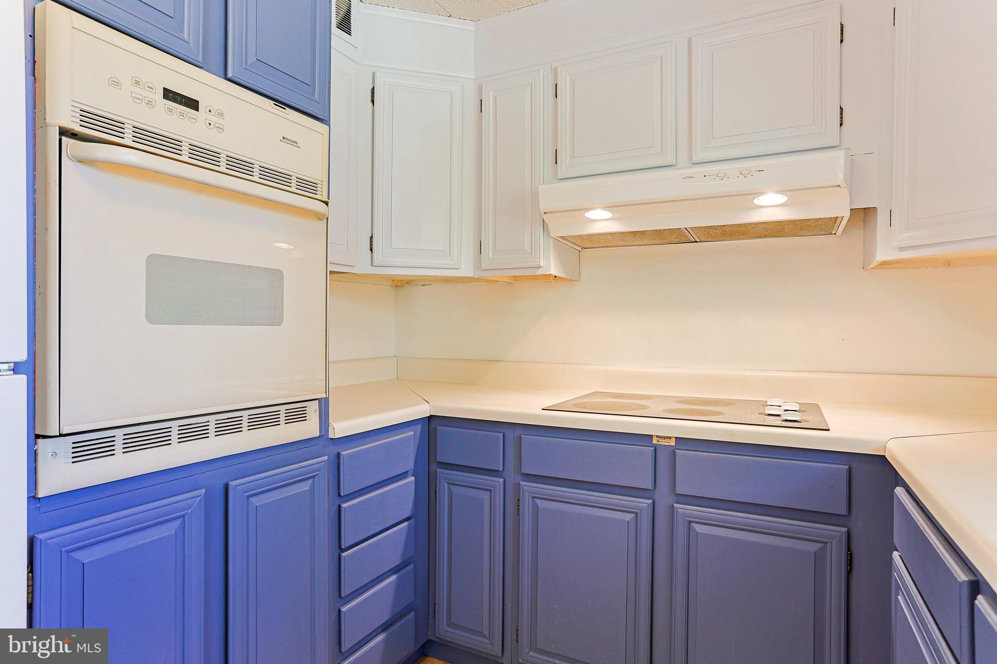 318 Exton Lane Exton, PA 19341 - Photo 11 of 41 a kitchen with granite countertop cabinets and white appliances