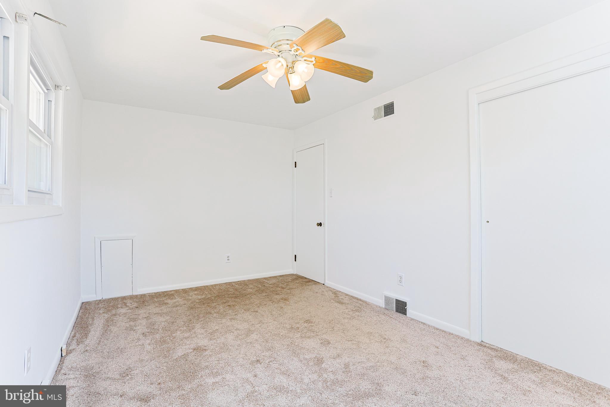 318 Exton Lane Exton, PA 19341 - Photo 15 of 41 an empty room with a fan & a window