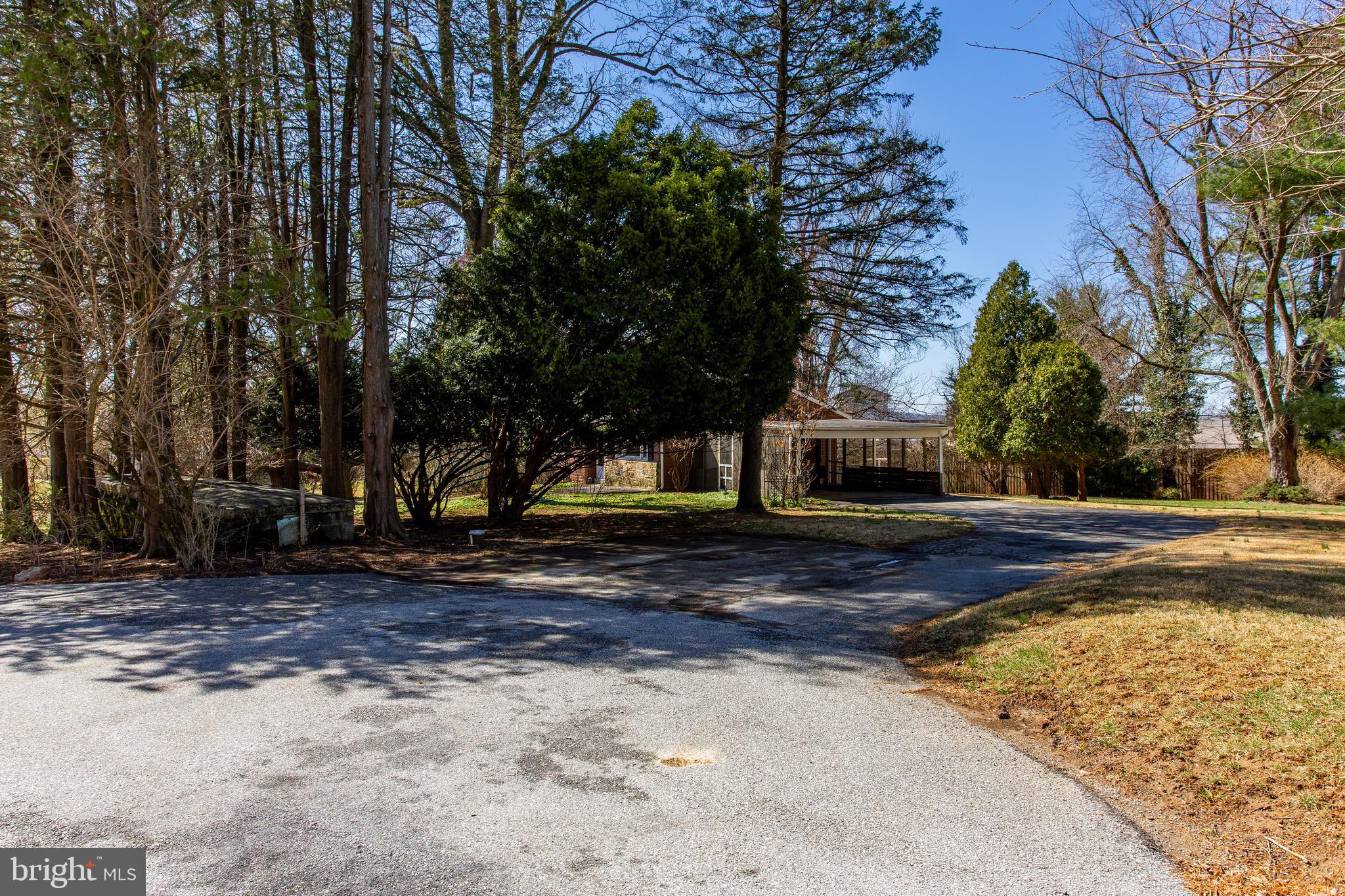 318 Exton Lane Exton, PA 19341 - Photo 2 of 41 a view of a yard with a tree