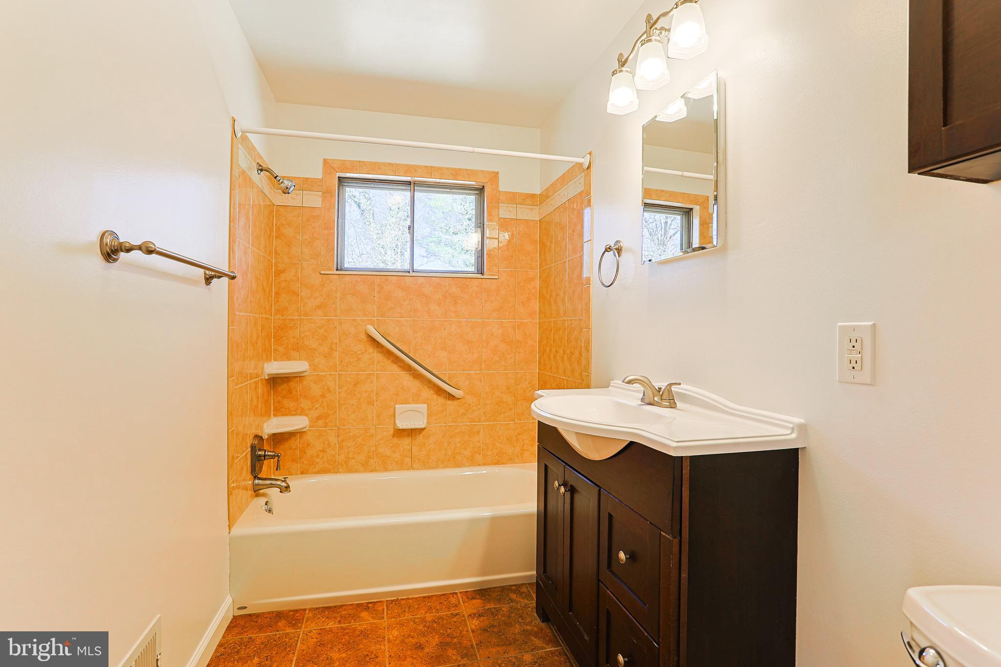 318 Exton Lane Exton, PA 19341 - Photo 21 of 41 a bathroom with a sink a toilet and shower