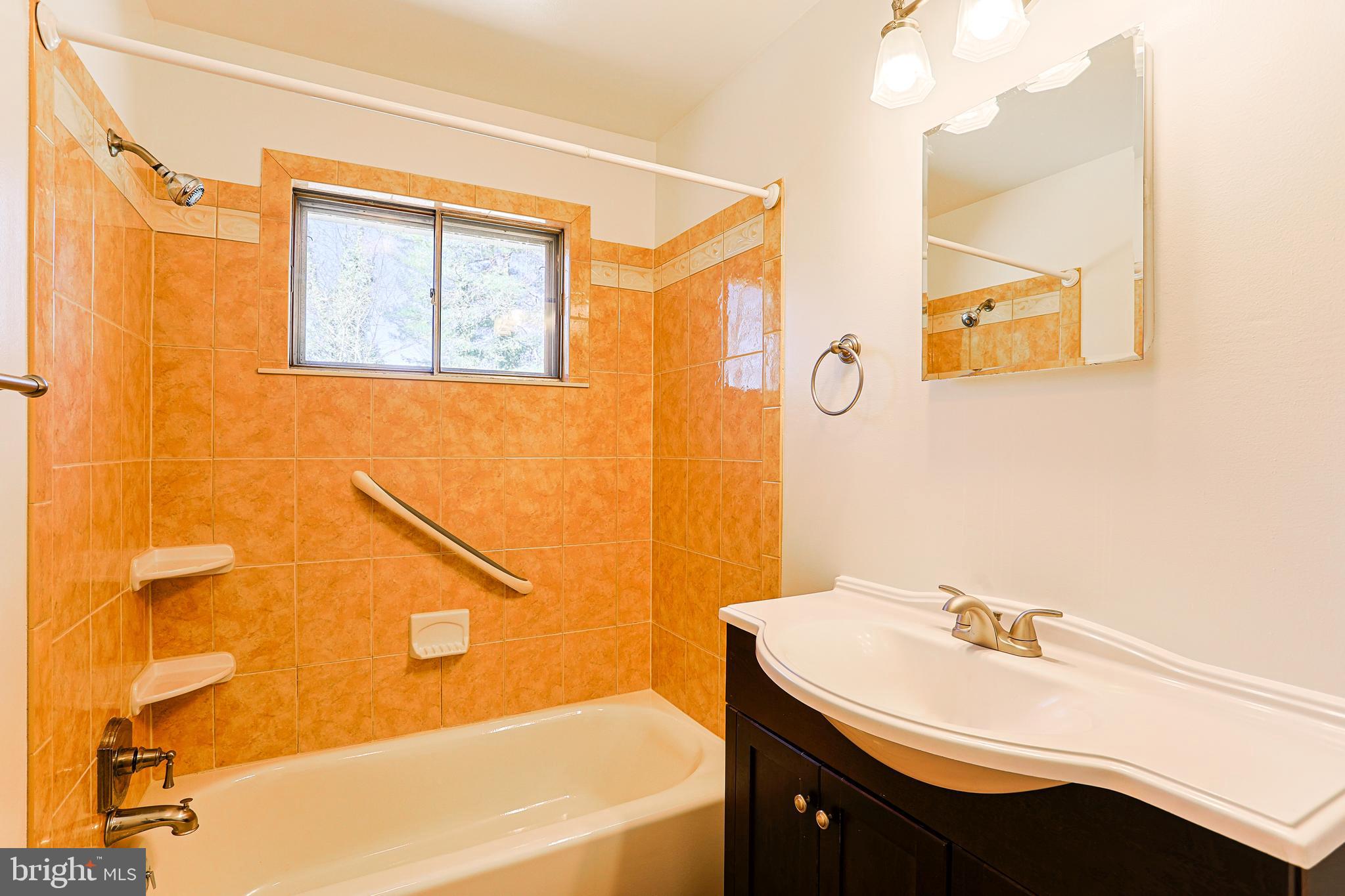 318 Exton Lane Exton, PA 19341 - Photo 22 of 41 a bathroom with a sink a bathtub and a shower