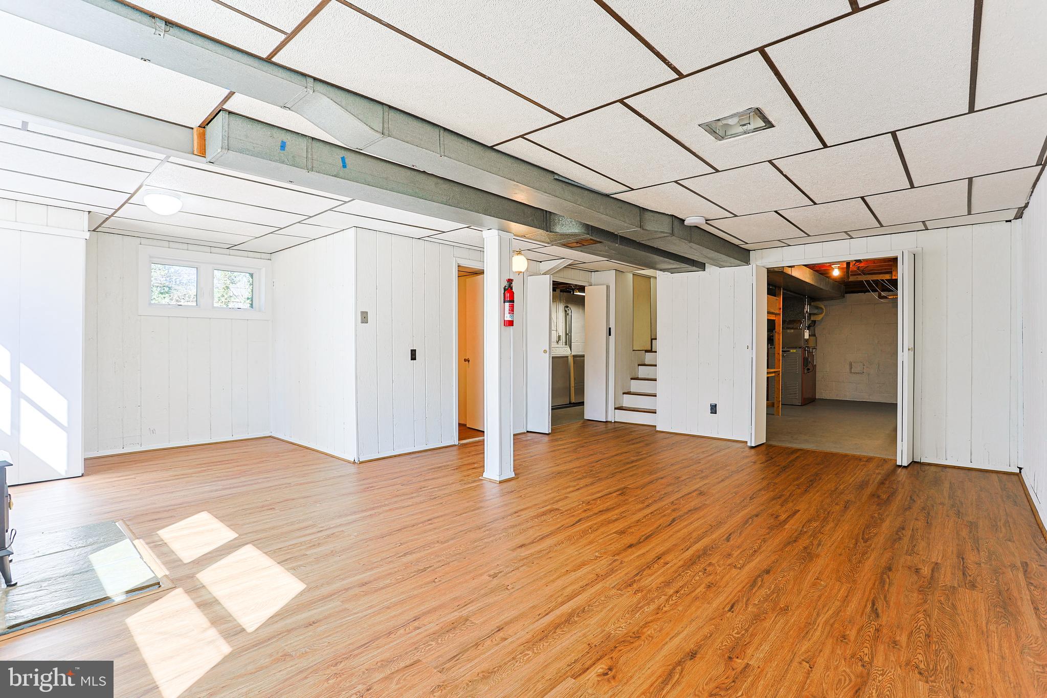 318 Exton Lane Exton, PA 19341 - Photo 25 of 41 a view of empty room with wooden floor