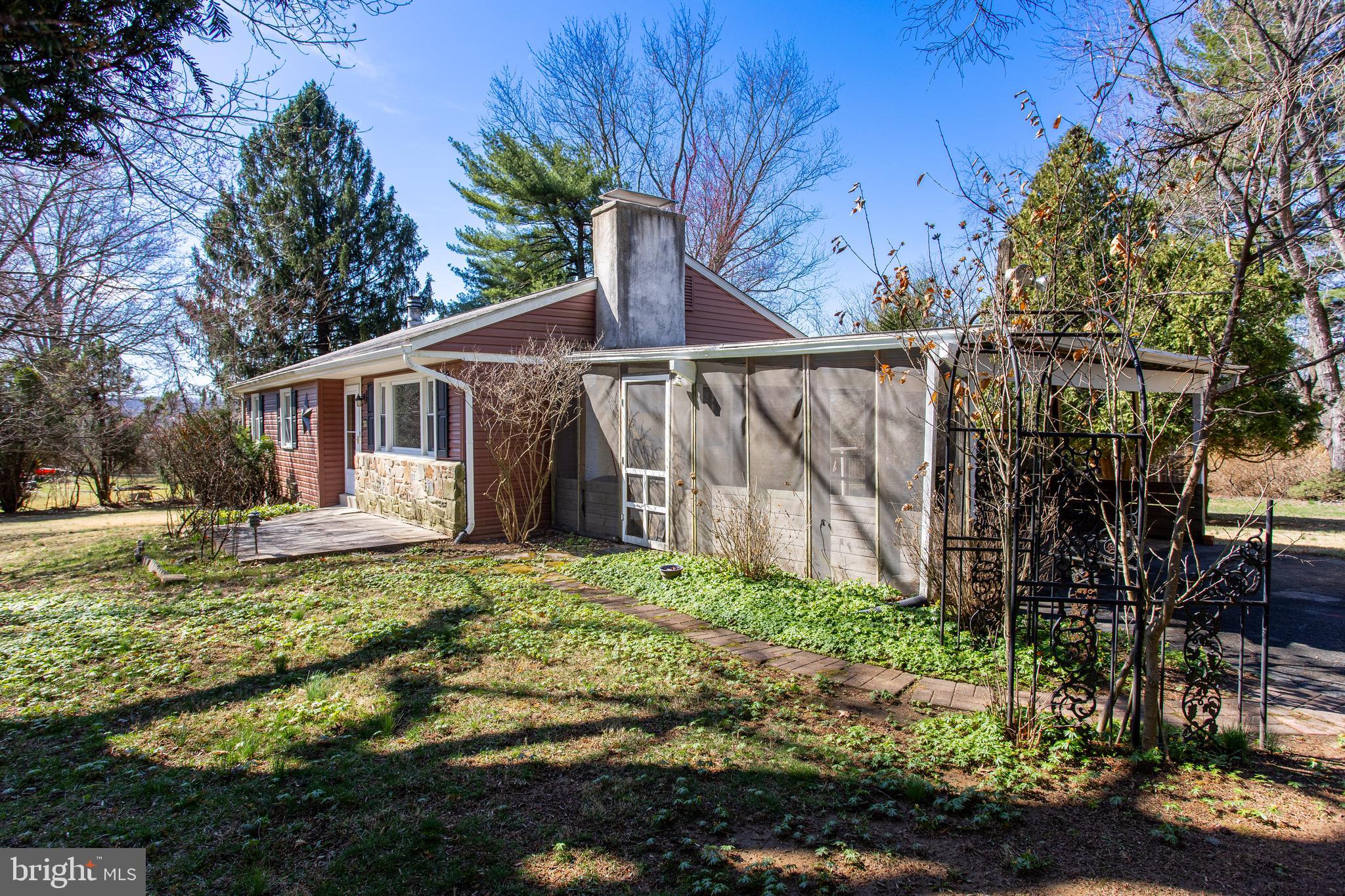 318 Exton Lane Exton, PA 19341 - Photo 36 of 41 a view of a house with backyard and sitting area