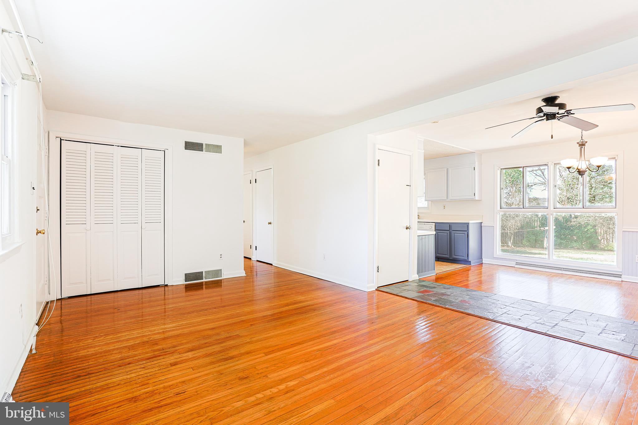 318 Exton Lane Exton, PA 19341 - Photo 6 of 41 a view of empty room with wooden floor and fan