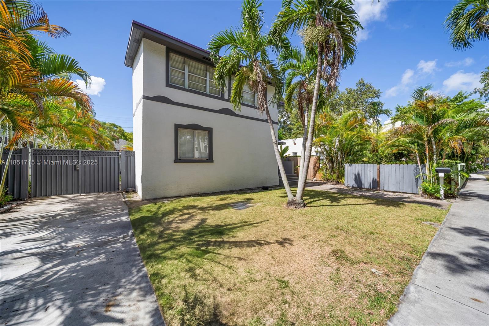 1520 Southwest 11th Terrace, Unit B Miami, FL 33135 - Photo 28 of 32 a view of a backyard with palm trees