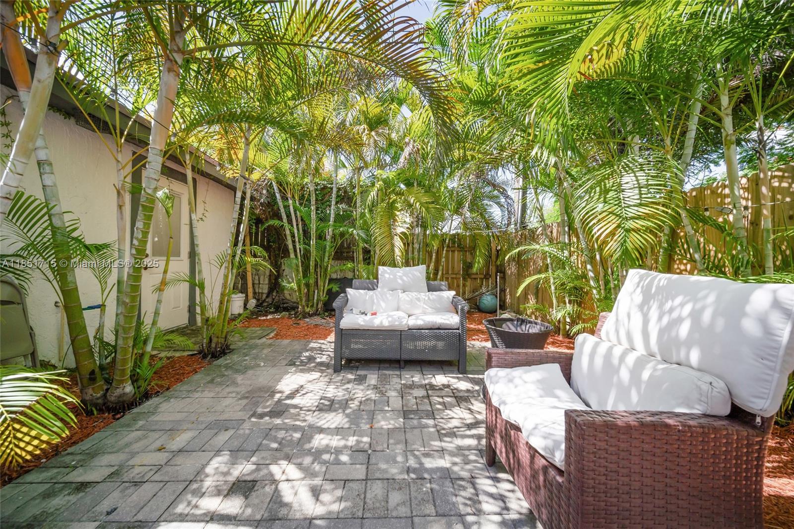 1520 Southwest 11th Terrace, Unit B Miami, FL 33135 - Photo 29 of 32 a view of a back yard of the house