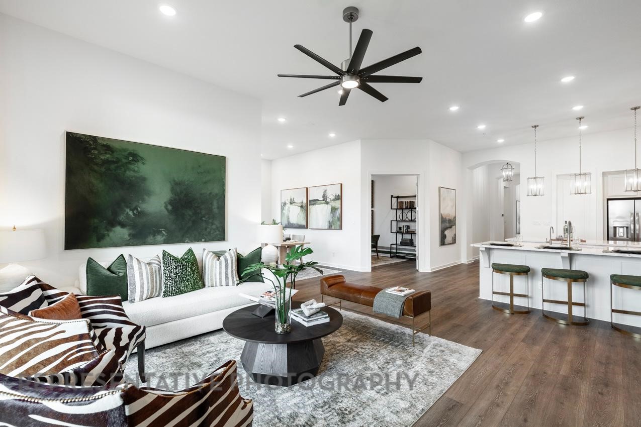 2714 Peach Vly Road Fulshear, TX 77423 - Photo 13 of 47 a living room with furniture and a flat screen tv