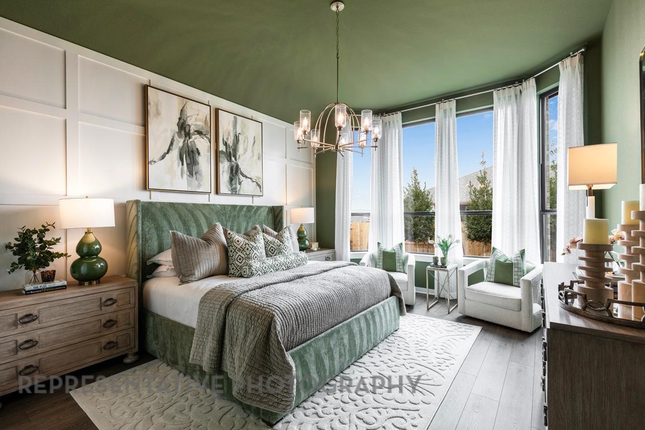 2714 Peach Vly Road Fulshear, TX 77423 - Photo 15 of 47 a bedroom with bed and a large window