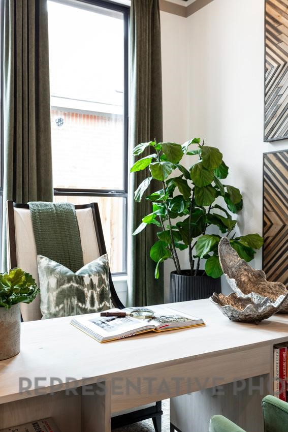 2714 Peach Vly Road Fulshear, TX 77423 - Photo 22 of 47 a vase of flowers sitting on a table with a fireplace