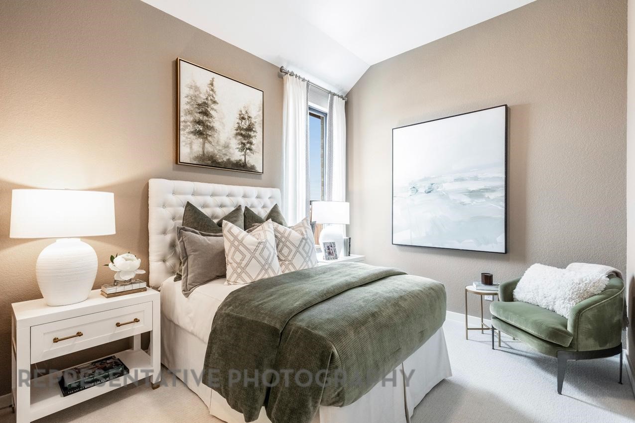 2714 Peach Vly Road Fulshear, TX 77423 - Photo 34 of 47 a bedroom with a bed and a painting on the wall