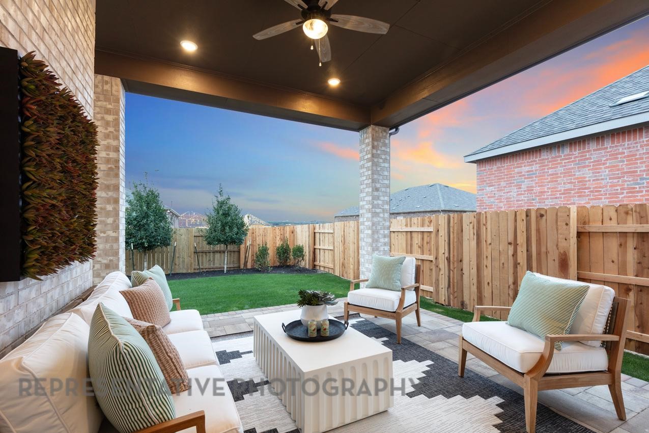 2714 Peach Vly Road Fulshear, TX 77423 - Photo 40 of 47 a view of a patio with couches chairs and a potted plant