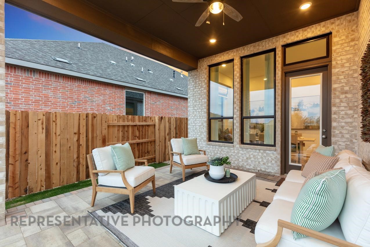2714 Peach Vly Road Fulshear, TX 77423 - Photo 42 of 47 a outdoor living space with furniture and large window