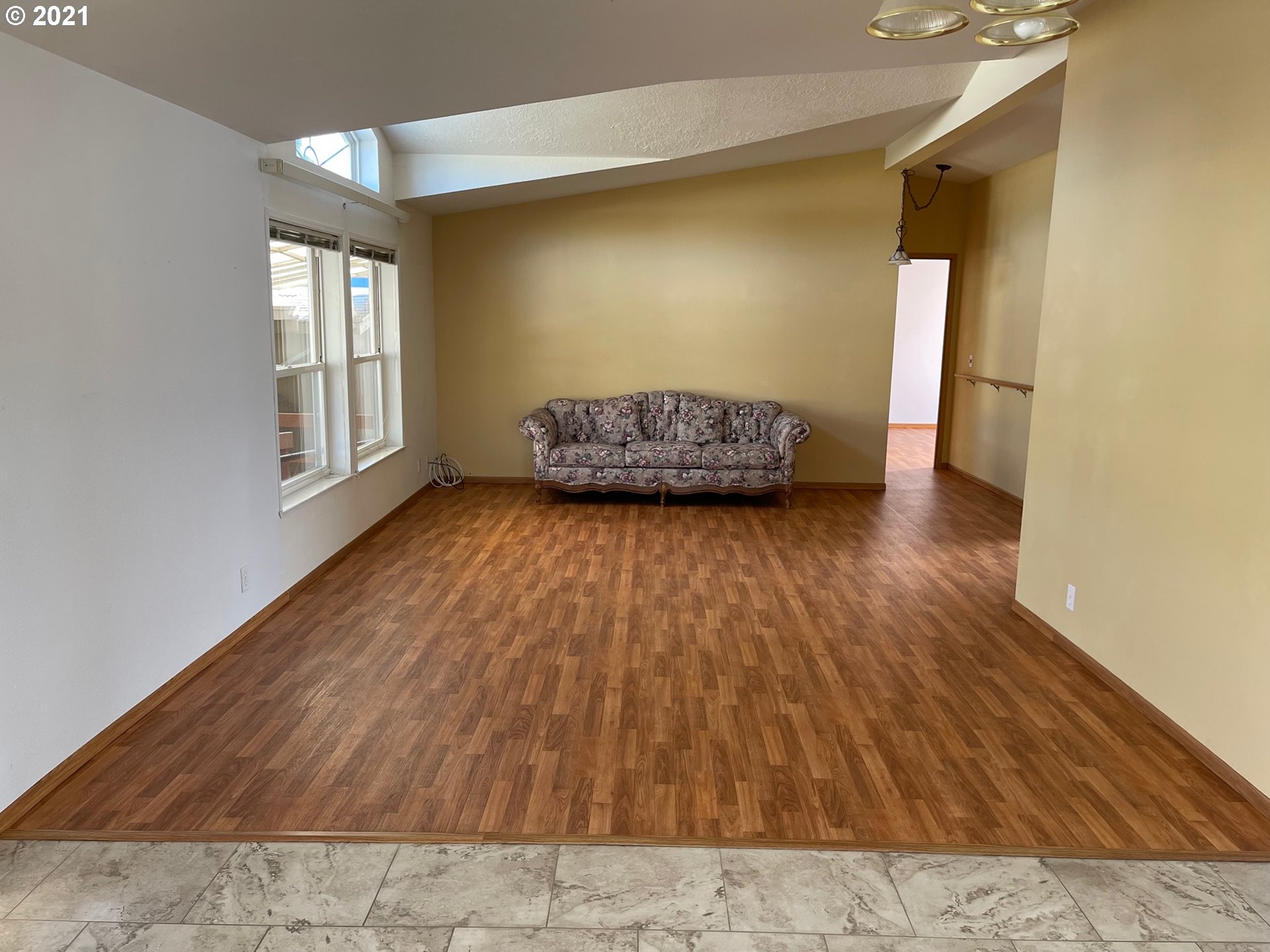 2150 Laura Street, Unit 61 Springfield, OR 97477 - Photo 16 of 24 a view of a room with wooden floor and stairs