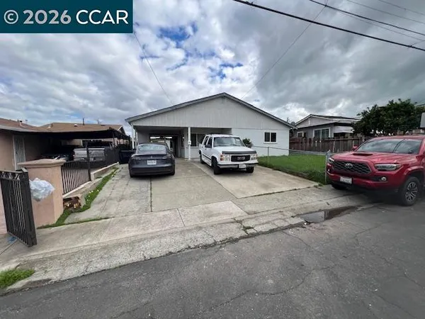 a car parked in front of a house