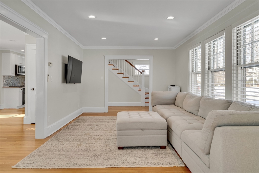 10 Dexter Road Lexington, MA 02420 - Photo 6 of 35 a living room with furniture and a flat screen tv