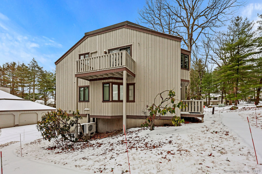 9 Talcott Ridge Road, Unit A4 Farmington, CT 06032 - Photo 23 of 28 a view of a house with a yard