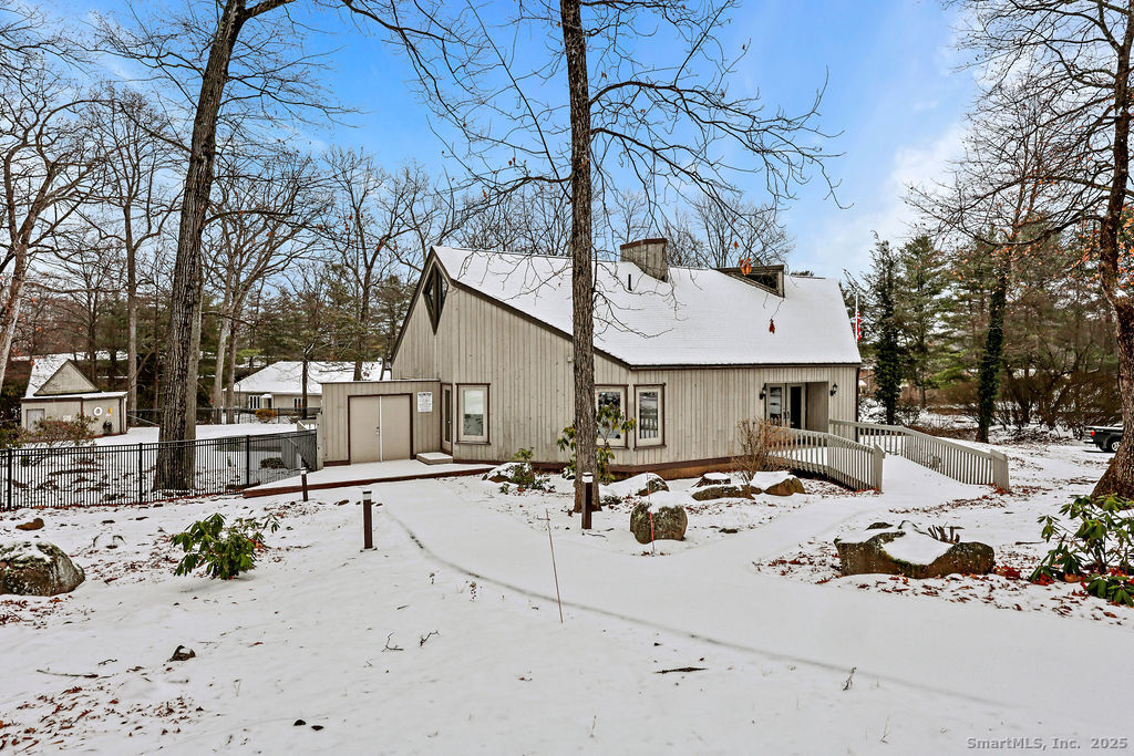 9 Talcott Ridge Road, Unit A4 Farmington, CT 06032 - Photo 25 of 28 a view of a lounge chair and fire pit in the patio
