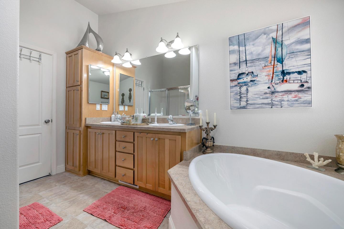 552 Filbert Street Half Moon Bay, CA 94019 - Photo 23 of 34 a bathroom with a tub a sink and a mirror