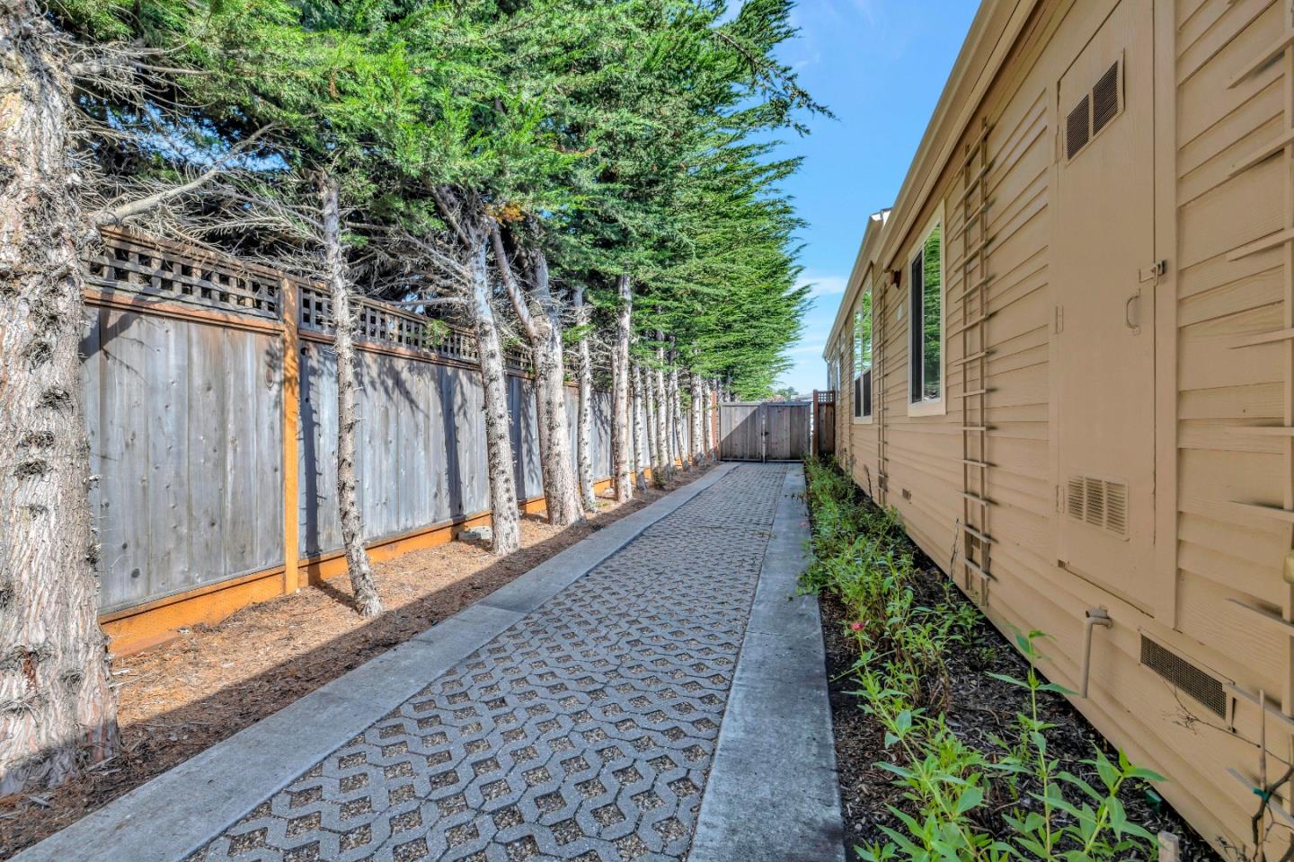 552 Filbert Street Half Moon Bay, CA 94019 - Photo 29 of 34 a view of a pathway of a building with wooden stairs