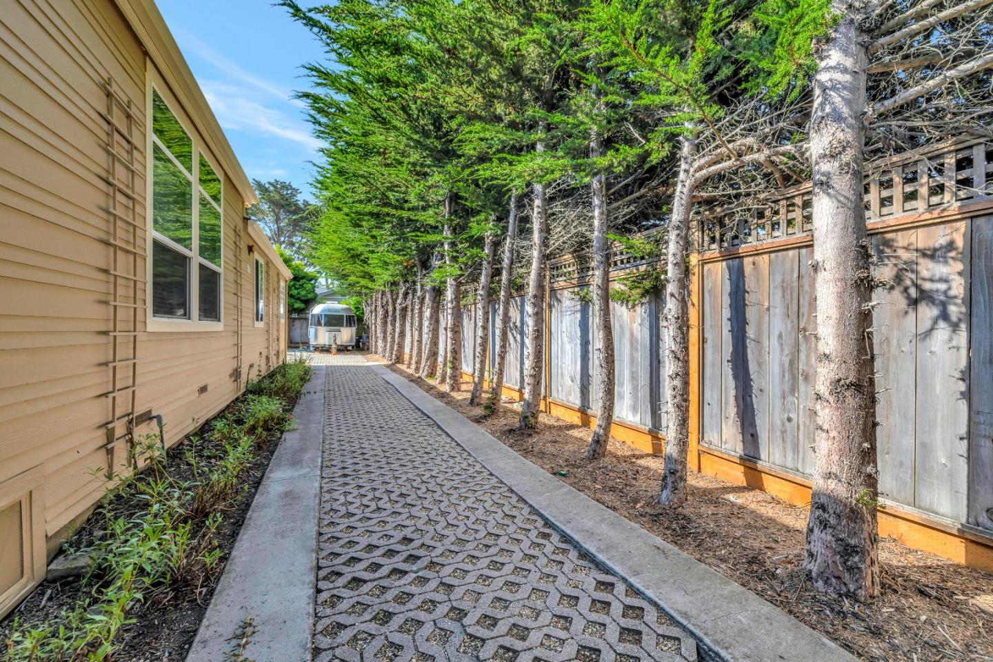 552 Filbert Street Half Moon Bay, CA 94019 - Photo 30 of 34 a view of a pathway of a house with wooden fence