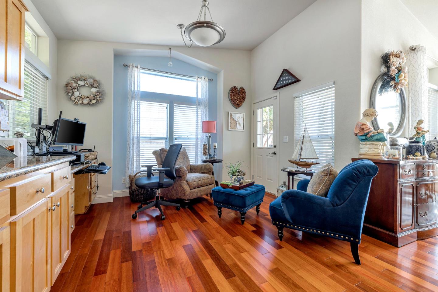 552 Filbert Street Half Moon Bay, CA 94019 - Photo 7 of 34 a living room with furniture and wooden floor