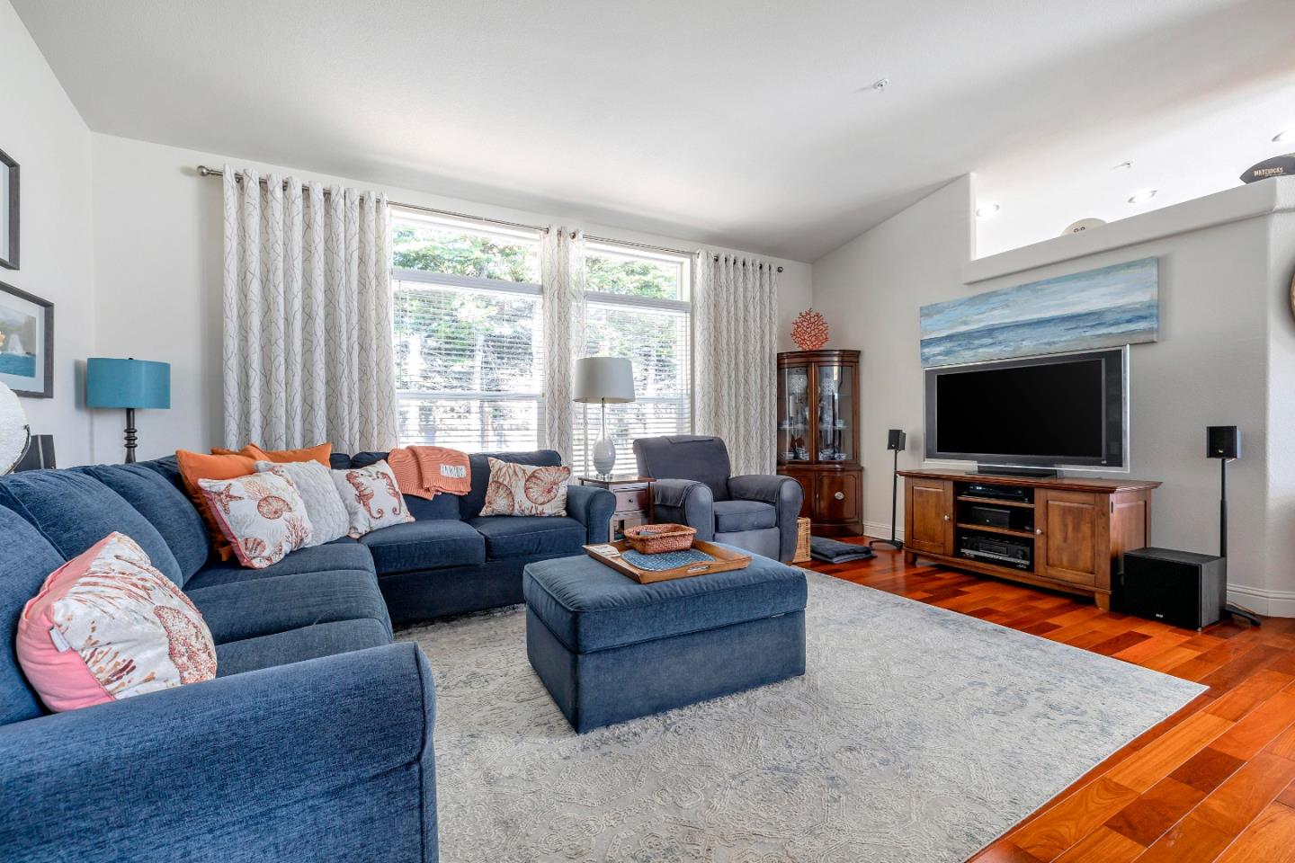 552 Filbert Street Half Moon Bay, CA 94019 - Photo 10 of 34 a living room with furniture and a flat screen tv