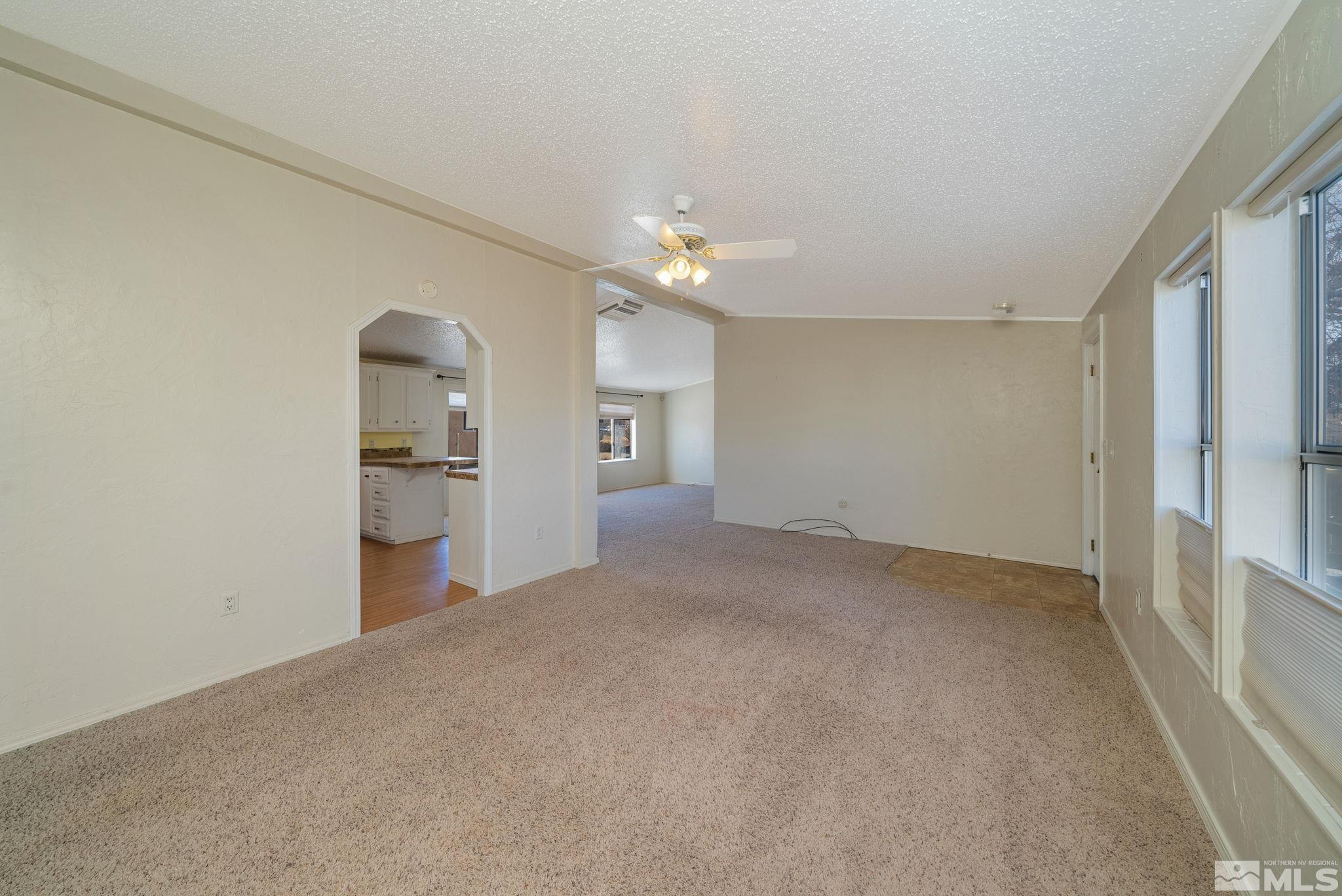 115 Gemini Circle Reno, NV 89521 - Photo 8 of 37 a view of a kitchen with a sink and a refrigerator