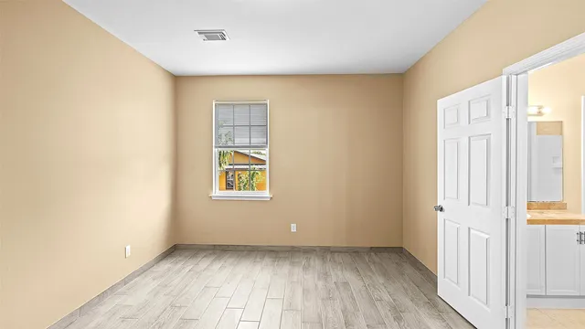 an empty room with windows