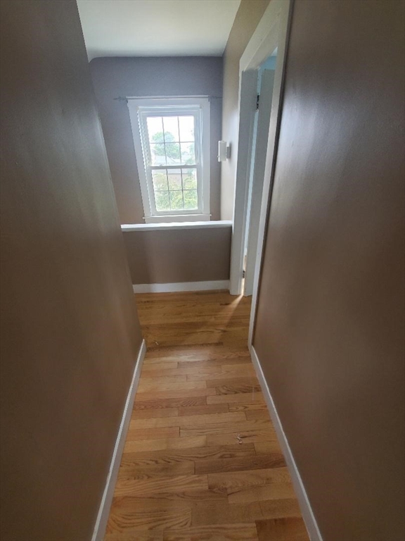250 Laurel Street Fall River, MA 02724 - Photo 20 of 34 wooden floor in an empty room with a window