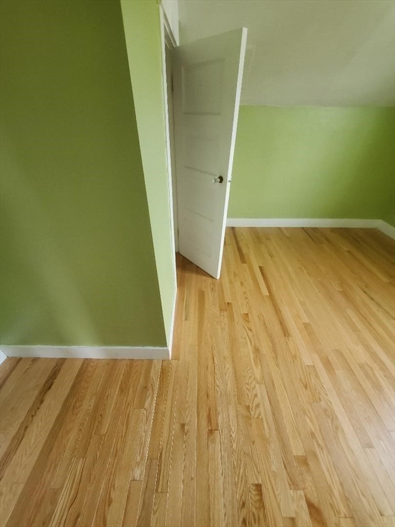 250 Laurel Street Fall River, MA 02724 - Photo 29 of 34 a view of room with wooden floor