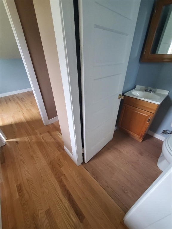 250 Laurel Street Fall River, MA 02724 - Photo 32 of 34 a view of a room with wooden floor