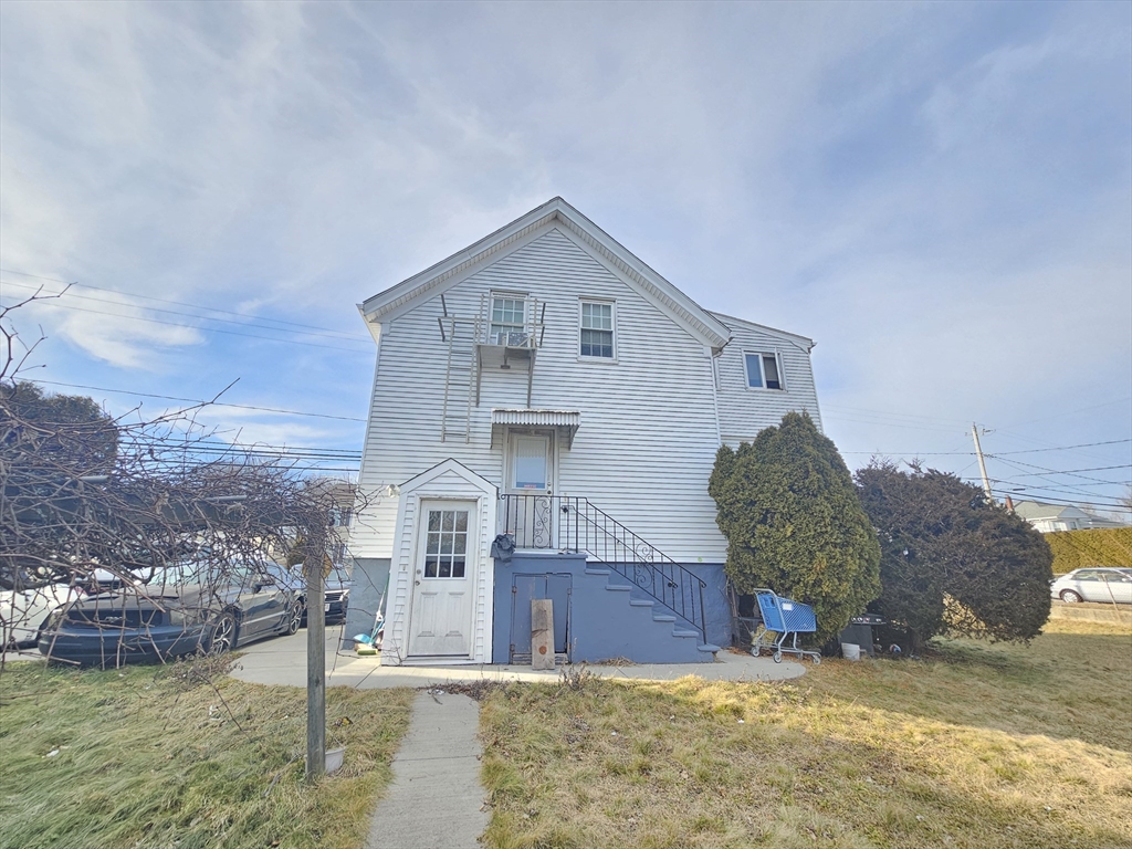 250 Laurel Street Fall River, MA 02724 - Photo 4 of 11 a view of a house with a yard