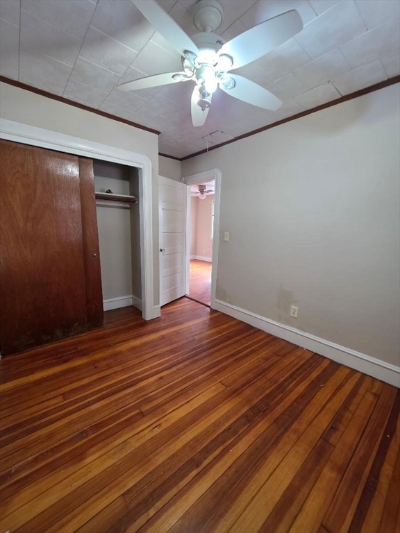 250 Laurel Street Fall River, MA 02724 - Photo 5 of 34 wooden floor in an empty room with a window