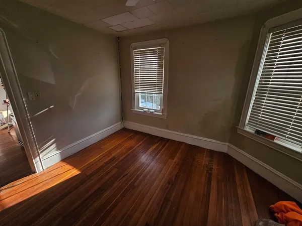 a bathroom with a shower and a toilet