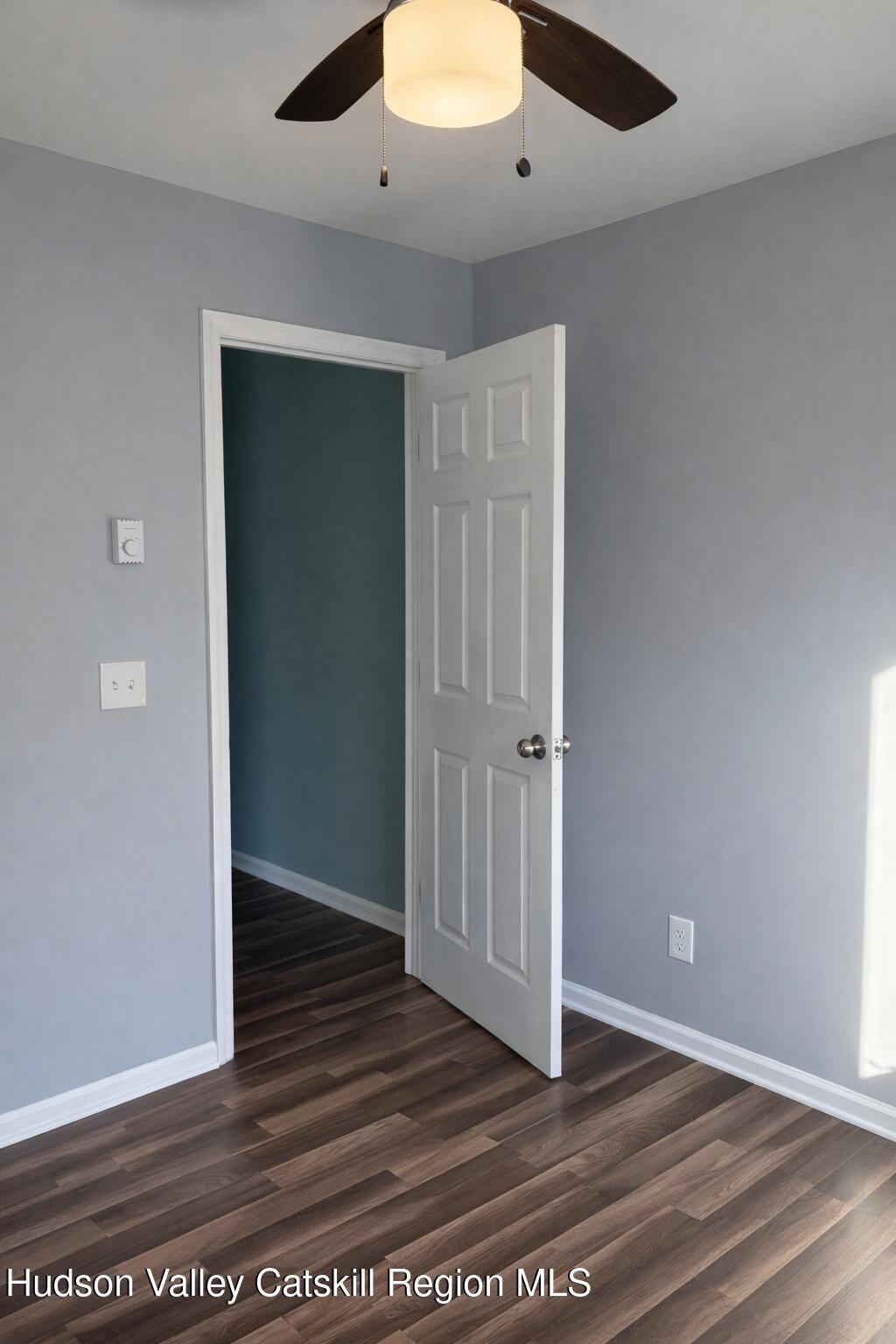 51 Hay Press Road Craryville, NY 12521 - Photo 15 of 27 an empty room with wooden floor and closet