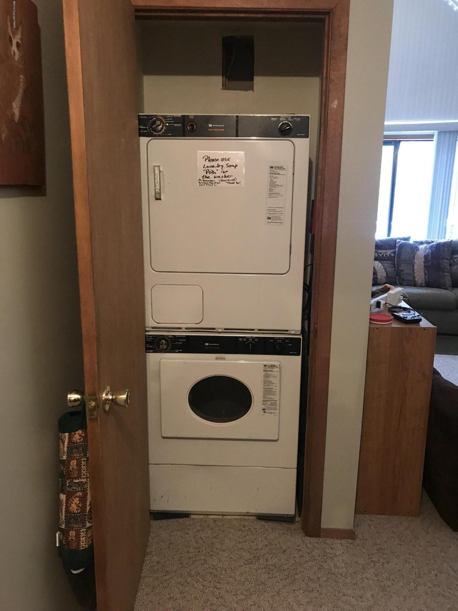 223 Pontiac Path Pocono Lake, PA 18347 - Photo 13 of 13 a utility room with dryer and washer