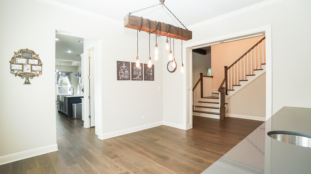 629 Germander Road Leander, TX 78641 - Photo 12 of 38 a view of entryway and hall with wooden floor