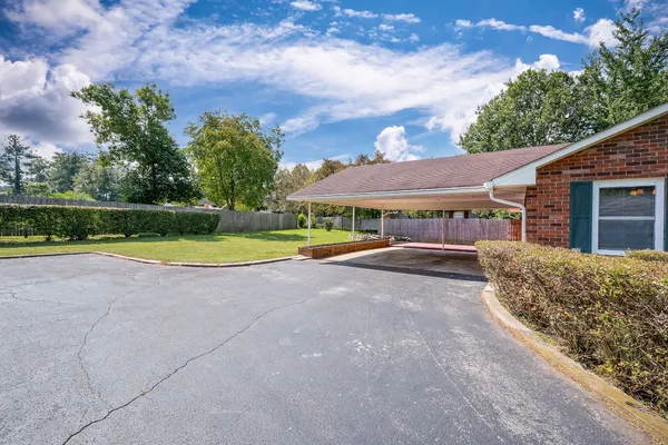 front view of a house with a patio