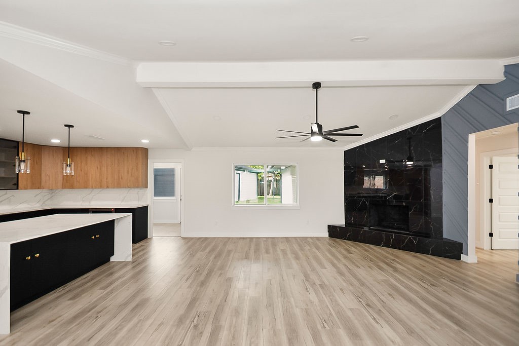 6106 Rutherglenn Drive Houston, TX 77096 - Photo 11 of 41 Another view of the expansive open-concept layout with vaulted ceilings and updated finishes throughout.
