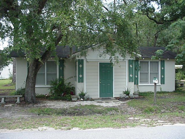 3021 Bay Grove Road Freeport, FL 32439 - Photo 1 of 1 front view of a house with a yard