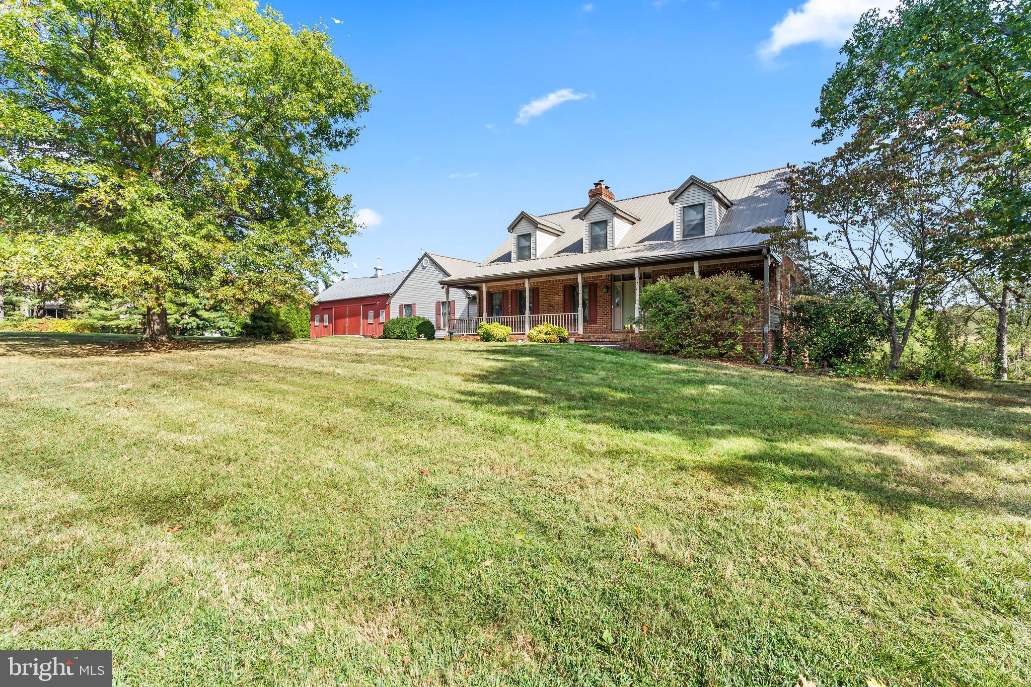 11625 Walnut Point Road Hagerstown, MD 21740 - Photo 117 of 118 a front view of a house with a yard