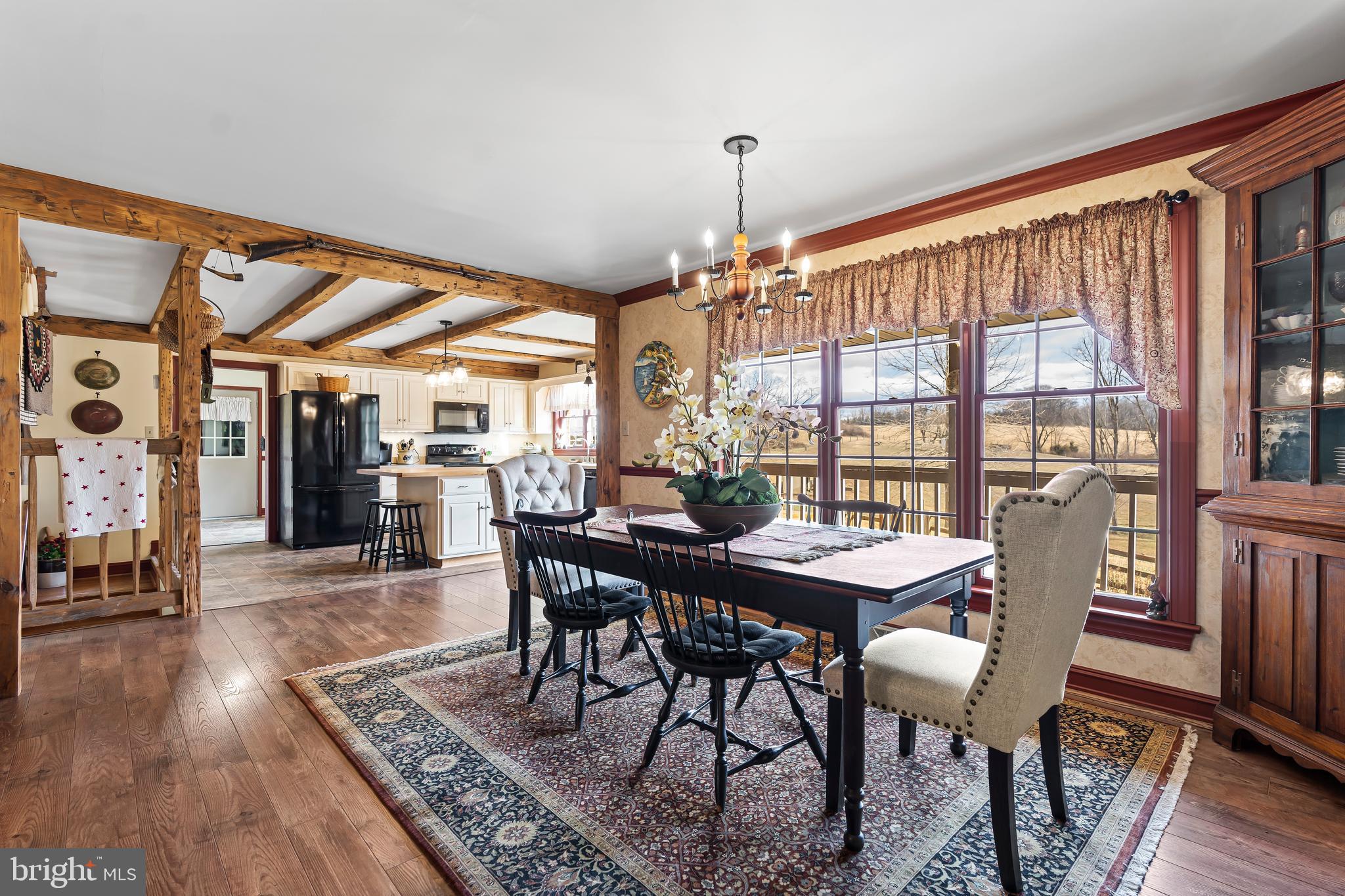 11625 Walnut Point Road Hagerstown, MD 21740 - Photo 25 of 118 a view of a dining room with furniture window and wooden floor