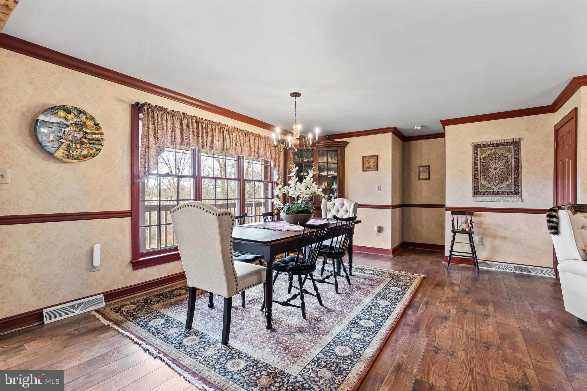 11625 Walnut Point Road Hagerstown, MD 21740 - Photo 28 of 118 a view of a dining room with furniture window and wooden floor