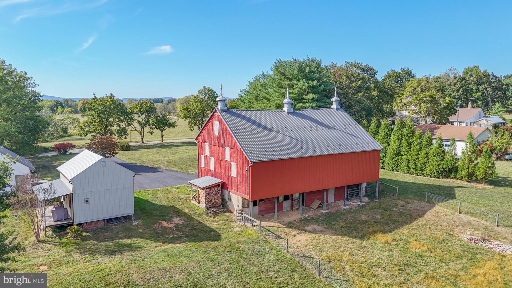 11625 Walnut Point Road Hagerstown, MD 21740 - Photo 7 of 118 an aerial view of a house with swimming pool and yard