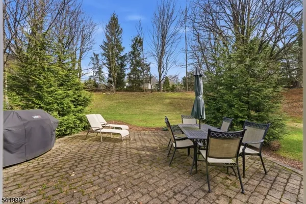 a lawn chairs sitting on a patio