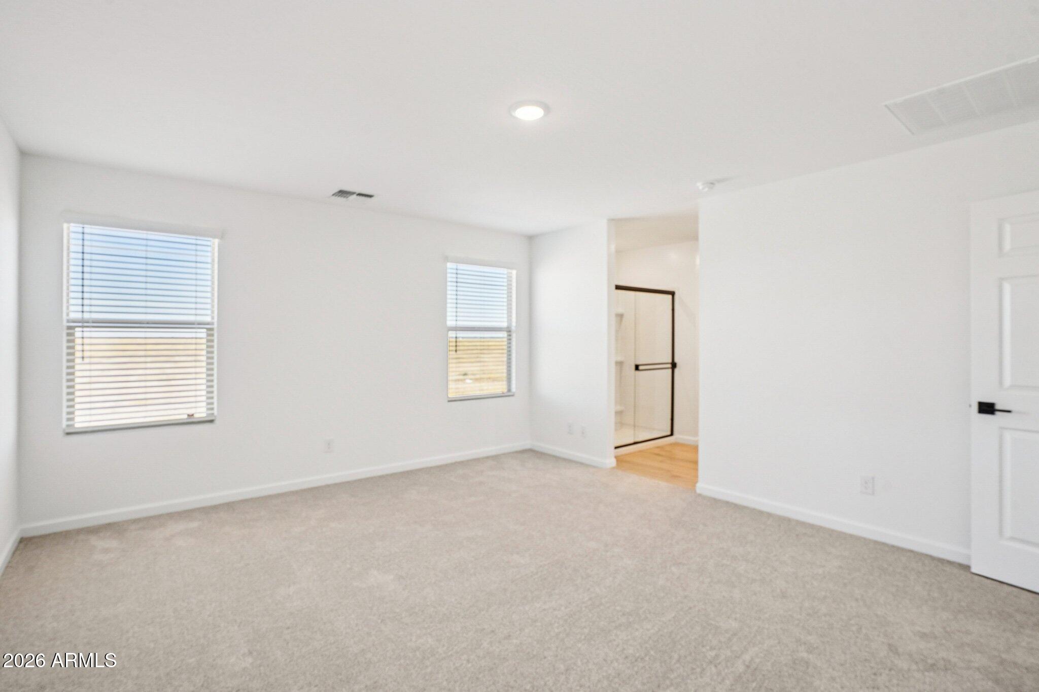 47638 West Moeller Road Maricopa, AZ 85139 - Photo 25 of 56 an empty room with windows and closet