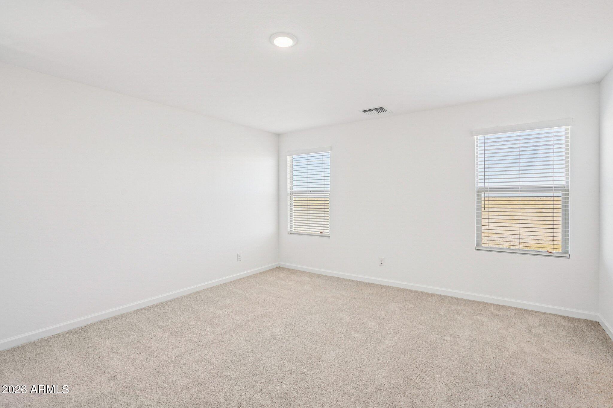 47638 West Moeller Road Maricopa, AZ 85139 - Photo 28 of 56 an empty room with a window