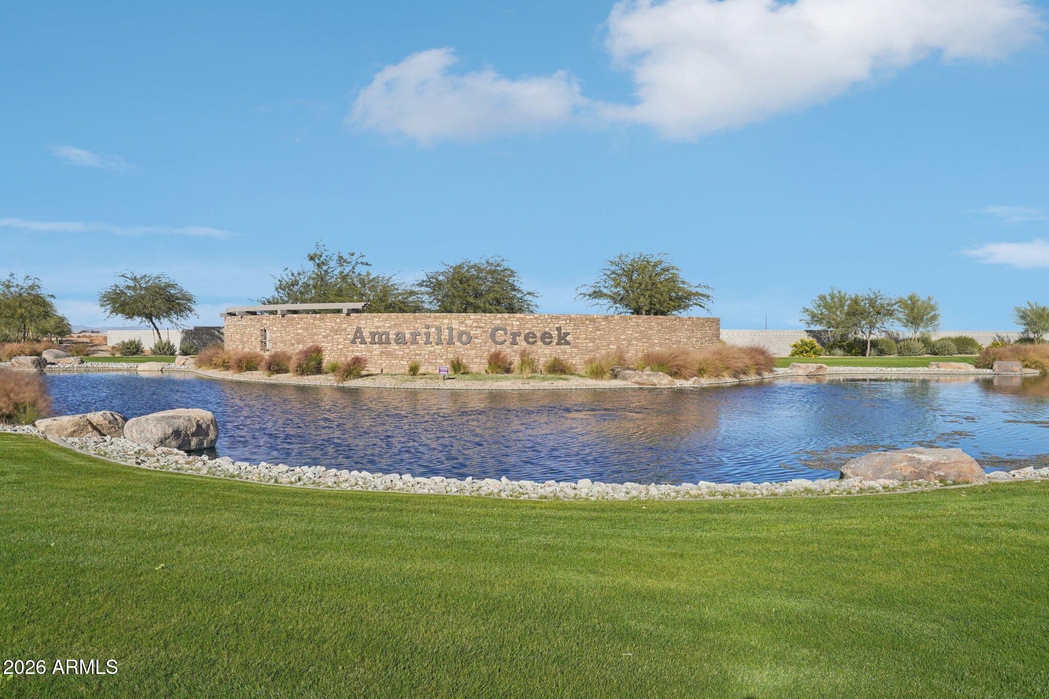 47638 West Moeller Road Maricopa, AZ 85139 - Photo 30 of 56 a view of a lake with houses
